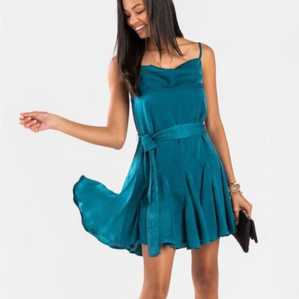Francesca’s turquoise dress